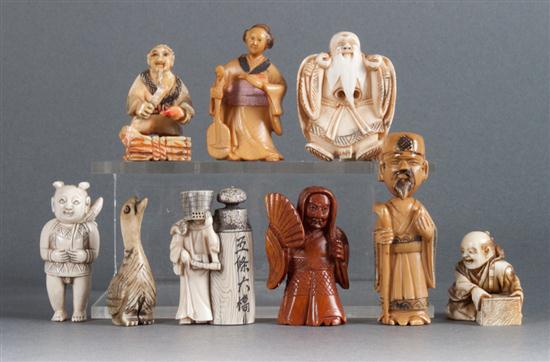 Nine carved ivory netsukes
