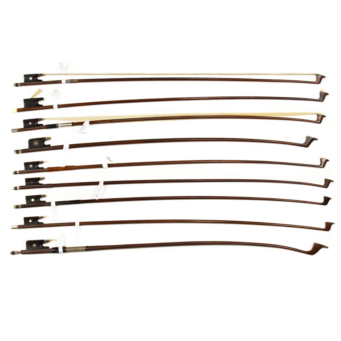 NINE CELLO AND VIOLIN BOWS,