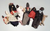 Nine cloth dolls: black and wh