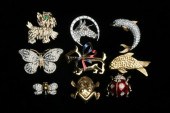 NINE COSTUME JEWELRY PINS IN F