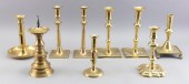 NINE ENGLISH BRASS CANDLESTICK