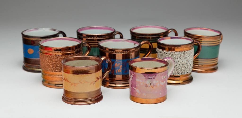 NINE ENGLISH COPPER LUSTER MUGS.