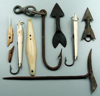 Nine fishing related items: three
