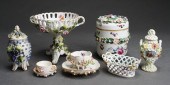 NINE FLORAL ENCRUSTED AND DECO