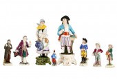 NINE GERMAN PORCELAIN FIGURESs