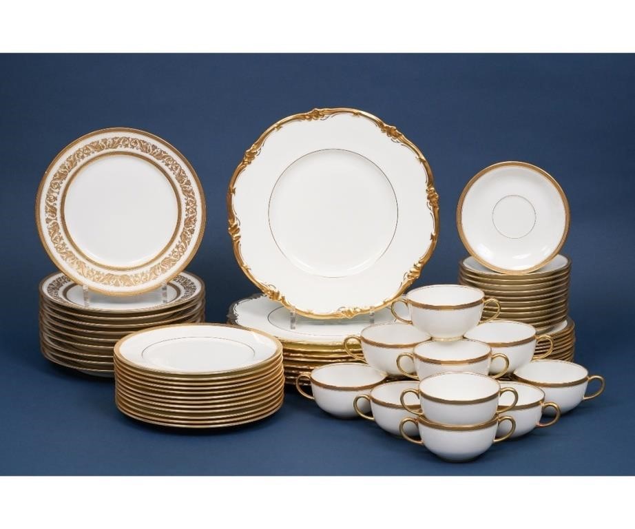 Nine gilt rim decorated dinner