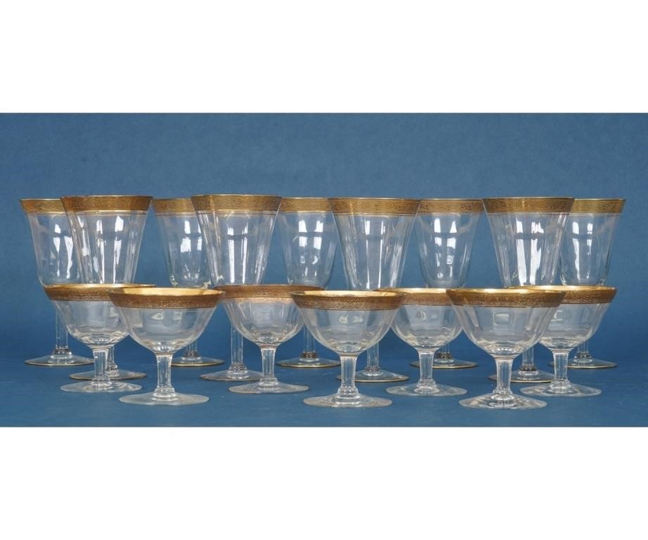 Nine gilt rimmed goblets, circa