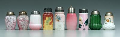 Nine glass shakers: various