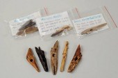 NINE INUIT CARVED FOSSILIZED H
