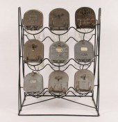 Nine large glass seed jars on