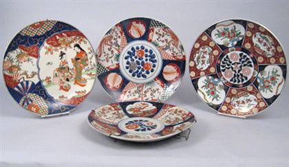 Nine large Japanese imari plates