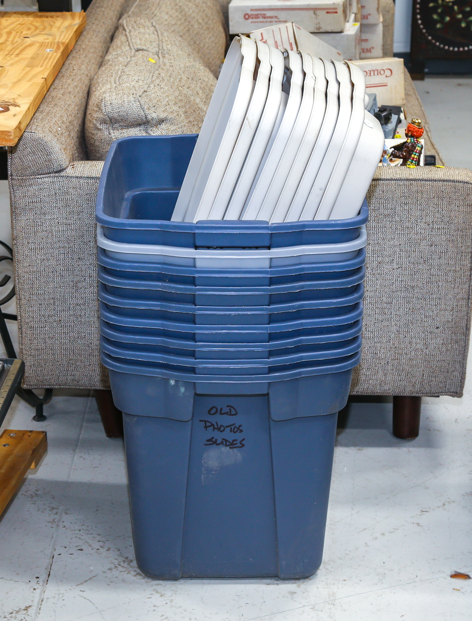 NINE LARGE PLASTIC TOTES & LIDS .