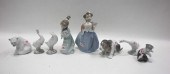 NINE LLADRO PORCELAIN FIGURINE