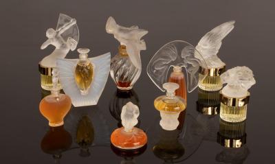 Nine miniature perfume bottles