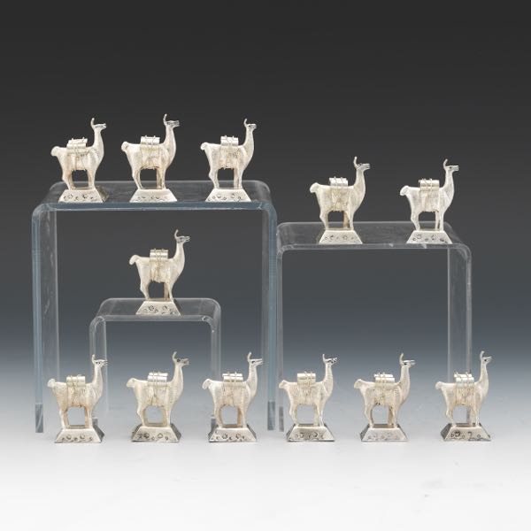 NINE PERUVIAN SILVER LLAMAS 1 ¾"