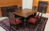 NINE-PIECE CARVED OAK DINING F