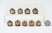 NINE PIECE GILT METAL FRAMED M