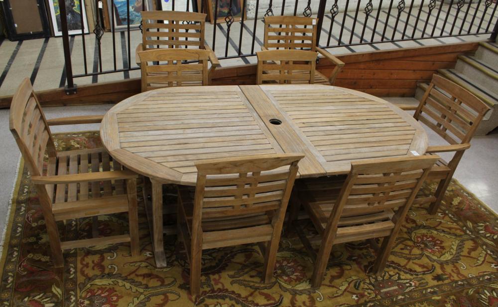 NINE-PIECE TEAK PATIO TABLE AND