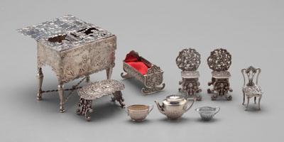 Nine pieces miniature silver: