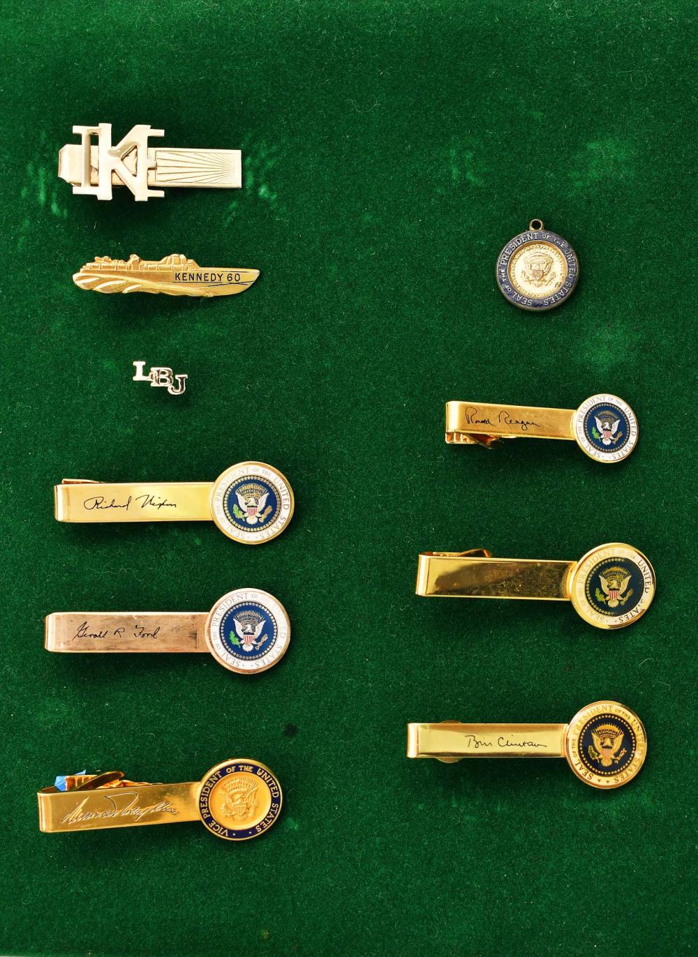 NINE PRESIDENTIAL TIE BARS, A PIN