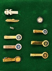 NINE PRESIDENTIAL TIE BARS, A