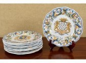 Nine Quimper plates, all with