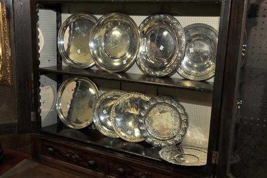 NINE ROUND STERLING SILVER TRAYS.