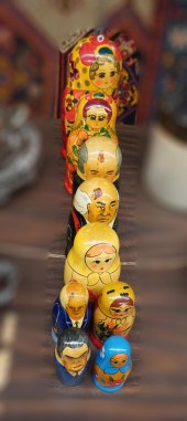 NINE RUSSIAN NESTING DOLLS, H