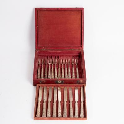 Nine silver dessert knives and
