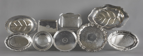 Nine silver plated trays.