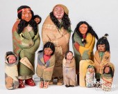 NINE SKOOKUM DOLLS OF VARIOUS