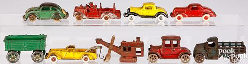 NINE SMALL CAST IRON VEHICLESNine