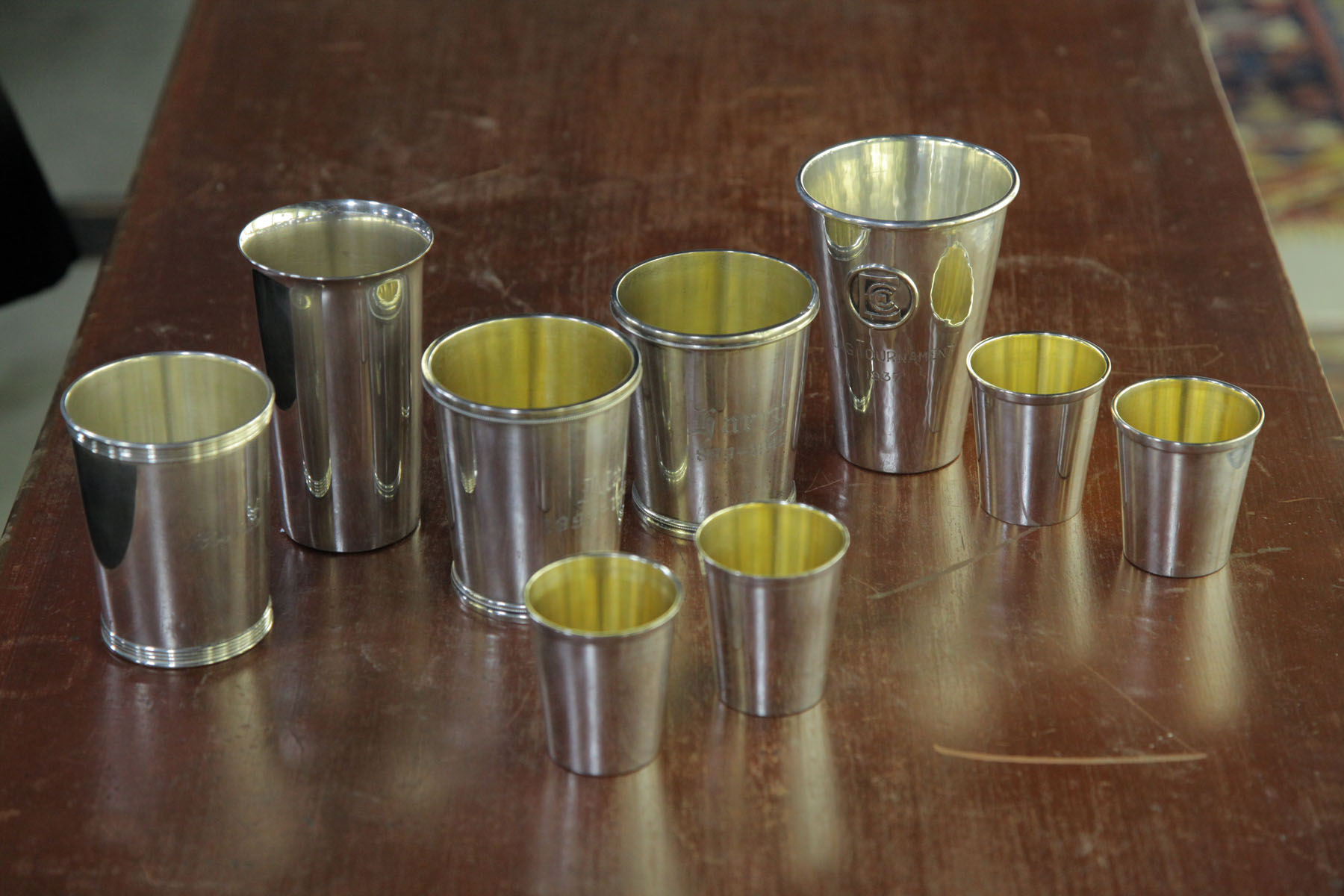 NINE STELRING SILVER JULEP CUPS. 