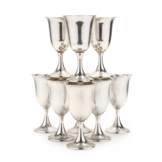 NINE STERLING SILVER GOBLETS BY