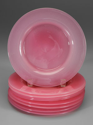 Nine Steuben rosaline plates: