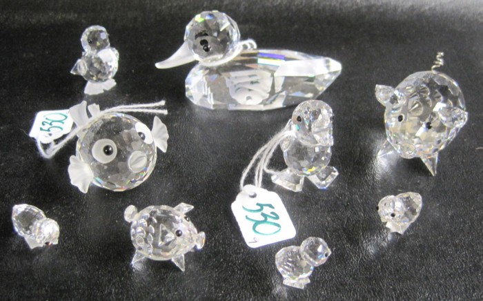 NINE SWAROVSKI CRYSTAL FIGURINES: