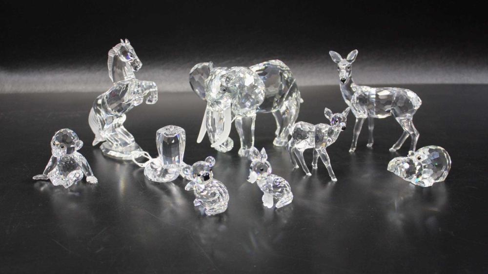 NINE SWAROVSKI CRYSTAL FIGURINES,