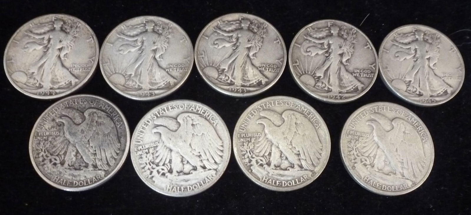 NINE WALKING LIBERTY 90% SILVER
