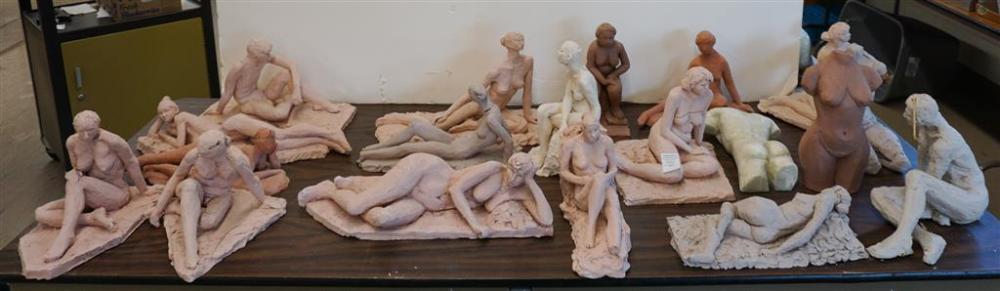 NINETEEN POTTERY FIGURES OF MEN AND