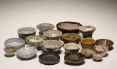 Nineteen Robert Lohman glazed