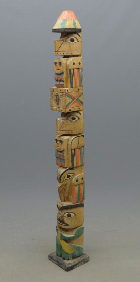 Northwest Coast painted totem pole.