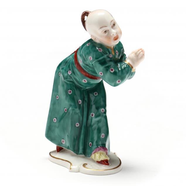 NYMPHENBURG PORCELAIN FIGURINE OF A