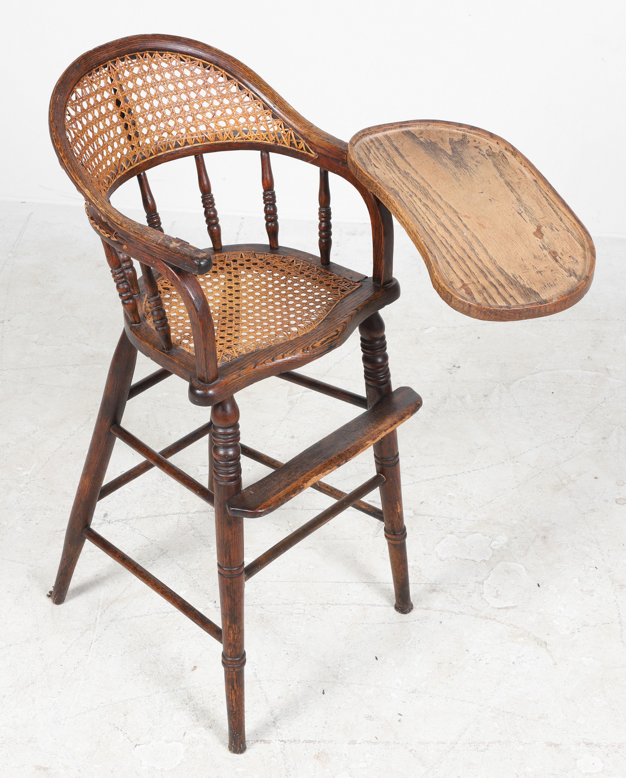 Oak and caned childs high chair,