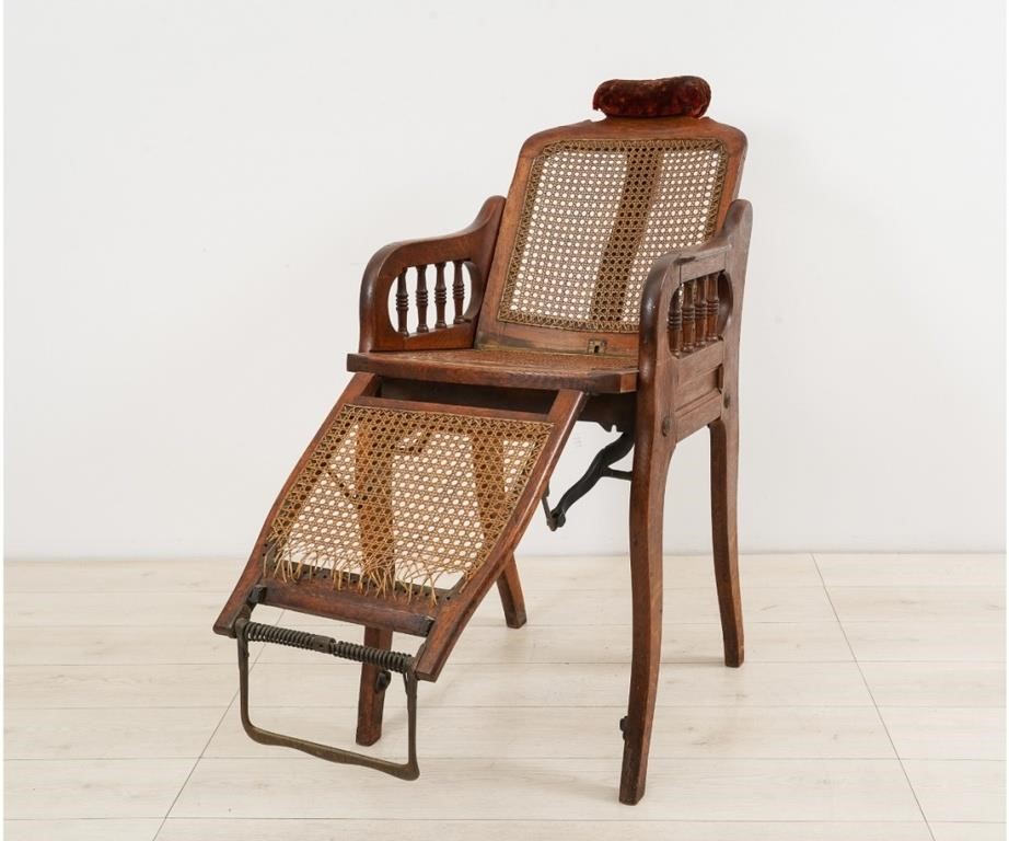 Oak barber chair, circa 1900,