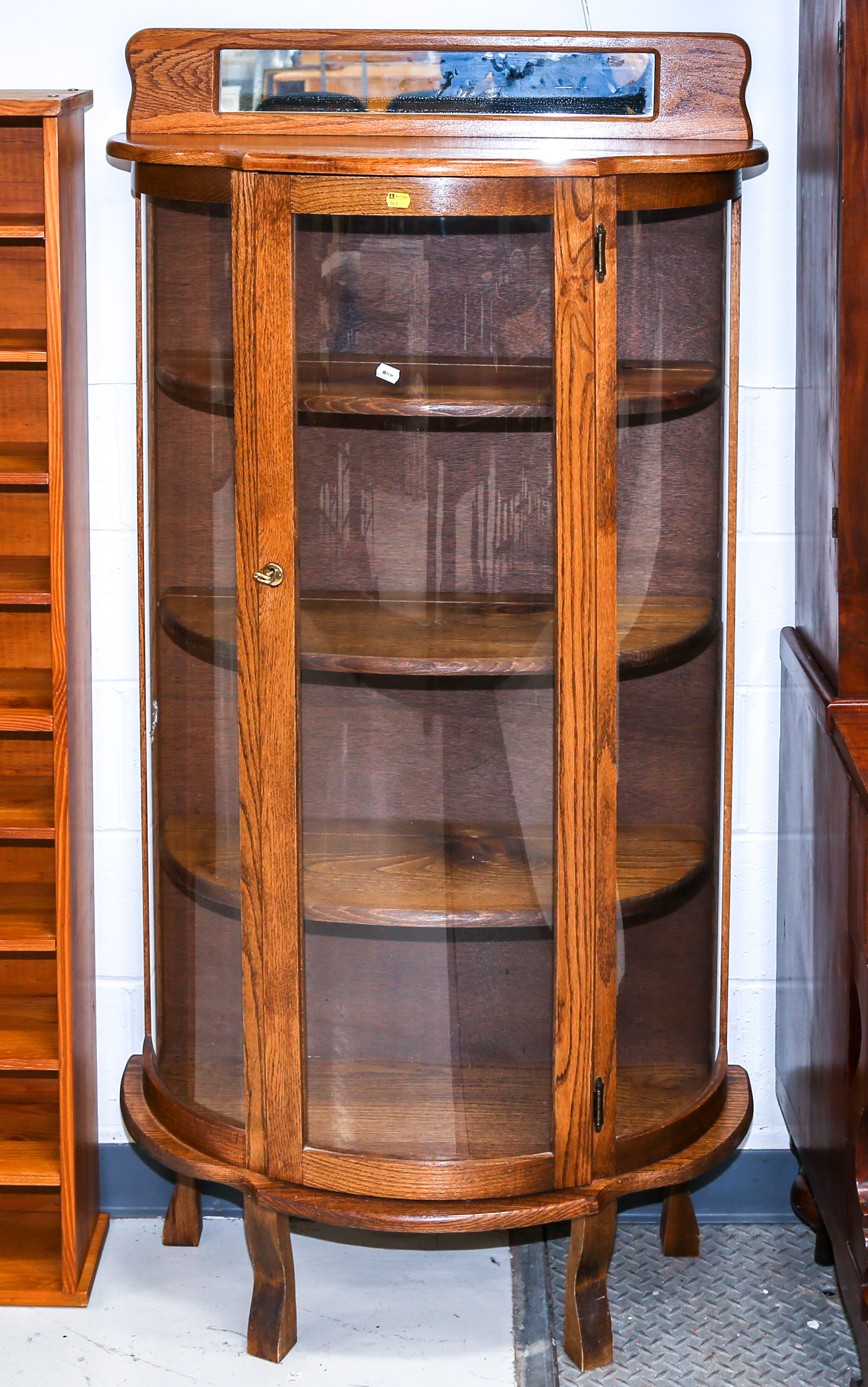 OAK BOW-FRONT CURIO CABINET 1st