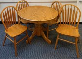 OAK DINETTE TABLE AND FOUR CHA