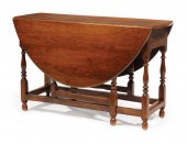 OAK GATE-LEG DINING TABLEAntiq