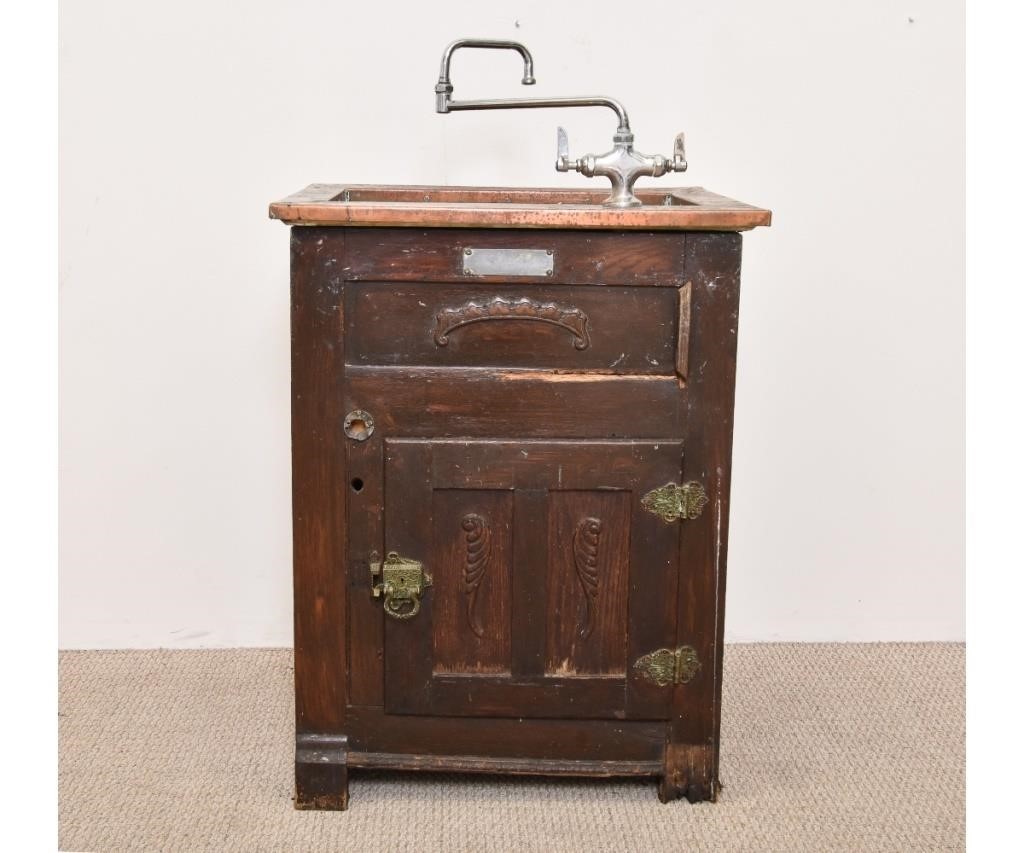 Oak icebox converted to a