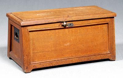 Oak paneled lift-top chest, brass