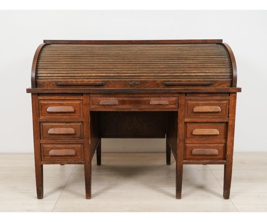 Oak roll top desk, circa 1900. 